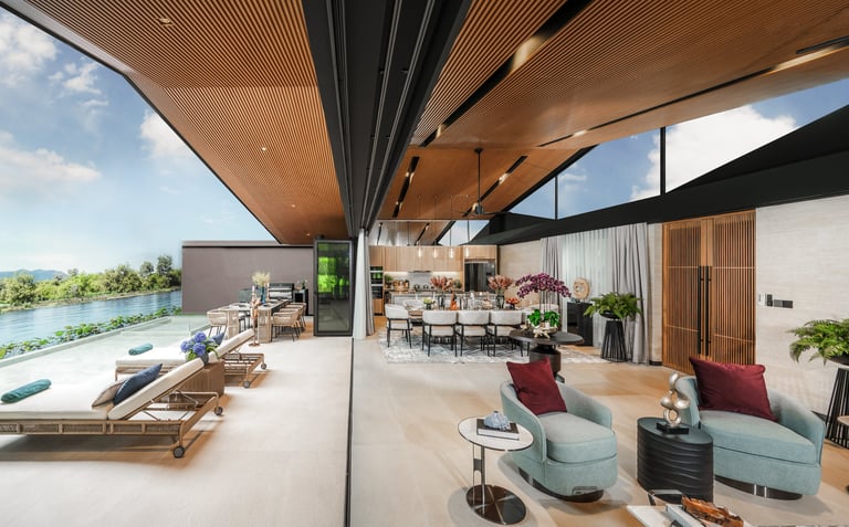 Modern open-plan living space with wood and dark ceiling, large windows overlooking water, contemporary furniture including blue armchairs and dining area