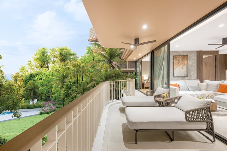 Modern terrace with lounge chairs overlooking garden, featuring contemporary seating, railing, and view of trees and lawn below